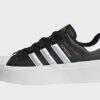 adidas Originals Superstar Bonega Schuh - Damen, Core Black / Cloud White / Gold Metallic